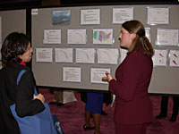 Maribel talks wtih Jenny about her poster
